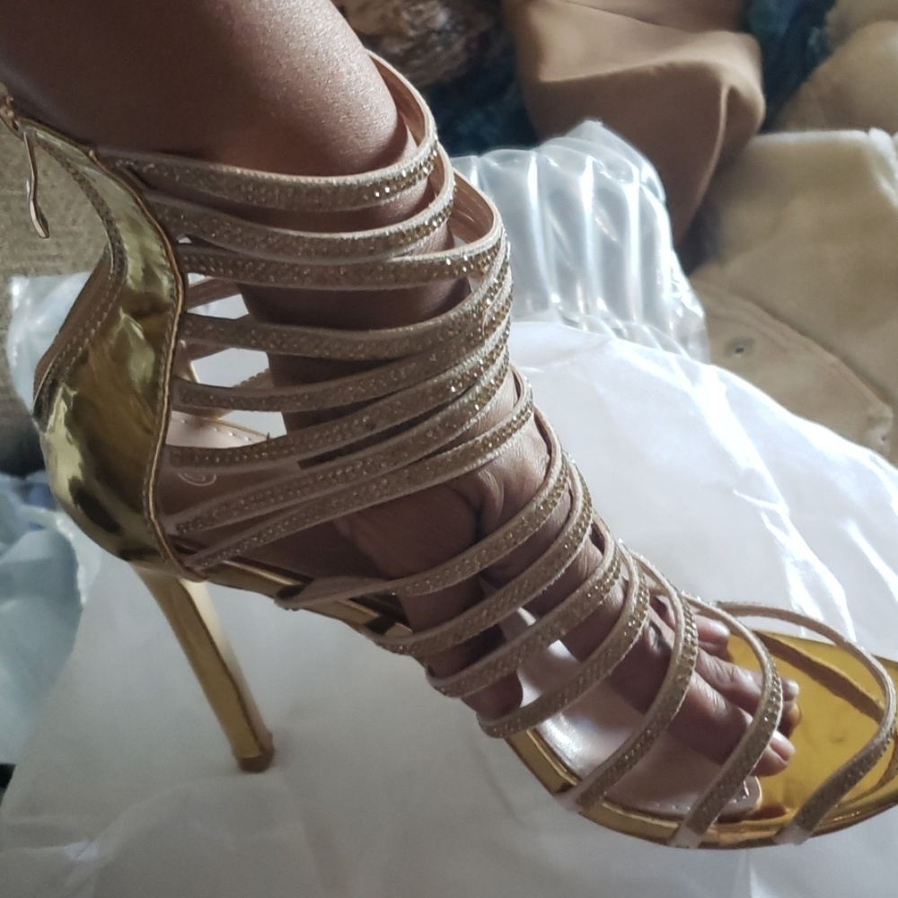 Golden stiletto heels. Brand new.